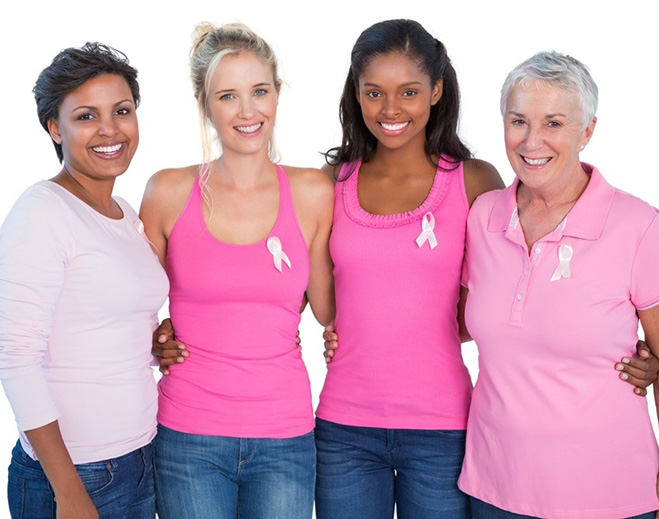 Group wearing pink ribbons for awareness