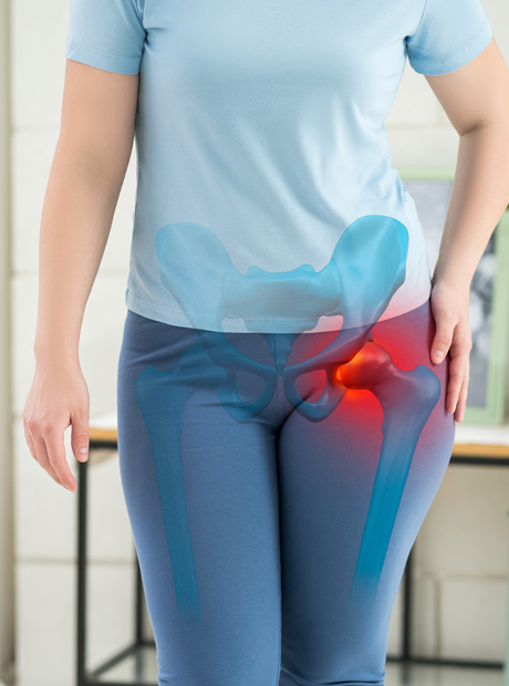 Person experiencing hip pain highlighted in red